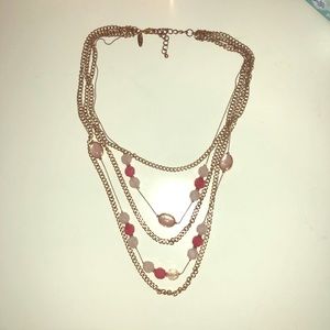 Gold necklace with pink stones